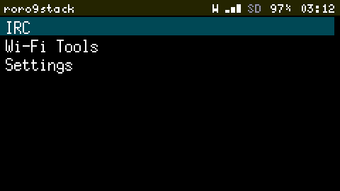The Cardputer's Launcher at 2x: a dark status bar reading roro9stack, with Wi-Fi bars, SD, 97 percent battery and 03:12; then IRC highlighted, Wi-Fi Tools and Settings