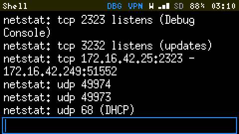 The Shell: netstat prints tcp 2323 listens (Debug Console), tcp 3232 listens (updates), tcp 172.16.42.25:2323 - 172.16.42.249:51552, udp 49974, udp 49973, udp 68 (DHCP).