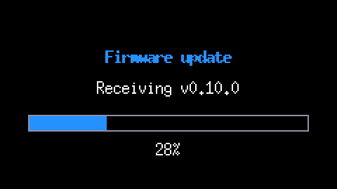 The full-screen progress of a firmware update: Receiving v0.10.0, a bar at 28 percent